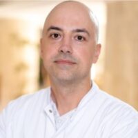 Conf. Radu Mitrica